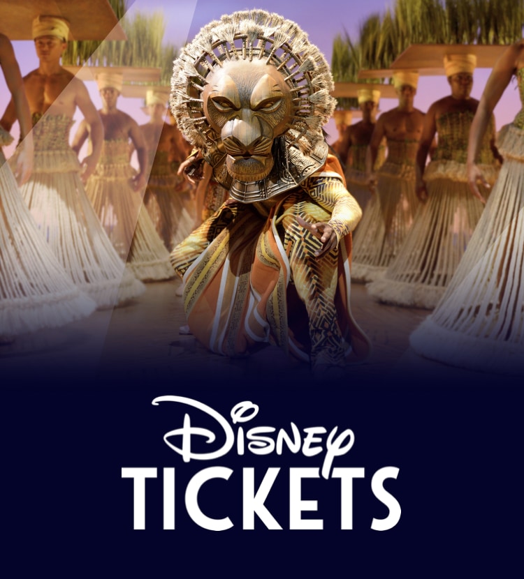 Disney Tickets promotion featuring a performer in a lion mask, mane headdress, and patterned robe from Disney's The Lion King stage production, with the ensemble cast in the background and the Disney Tickets logo displayed.
